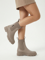 Apricot waterproof ankle boot with elastic side panels, pull tabs and chunky lug sole