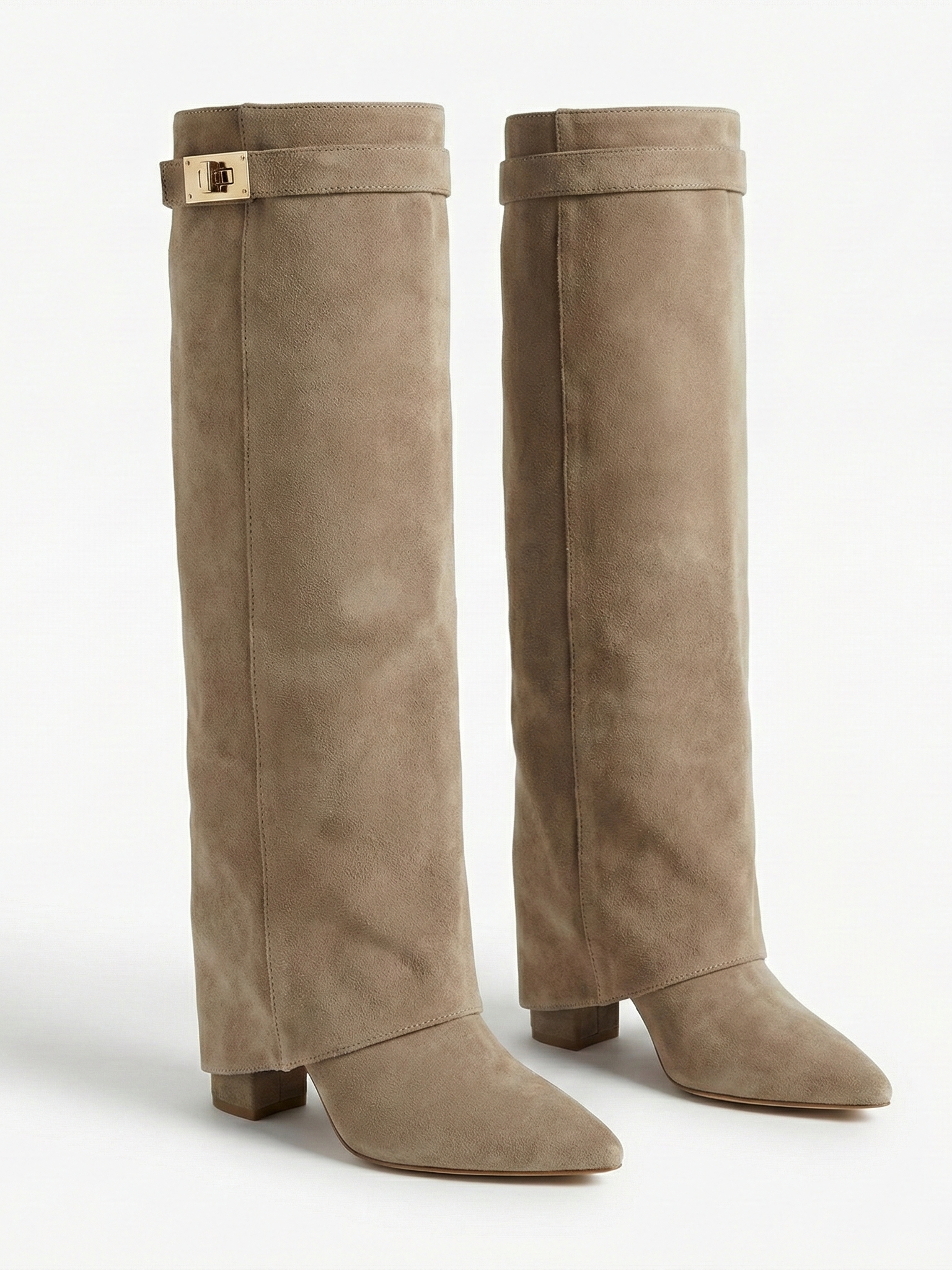 Apricot knee-high boot with a smooth suede-like finish, pointed toe, discreet low block heel, straight shaft design, and a slim metallic buckle detail at the top.