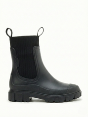 Black waterproof ankle boot with elastic side panels, pull tabs and chunky lug sole