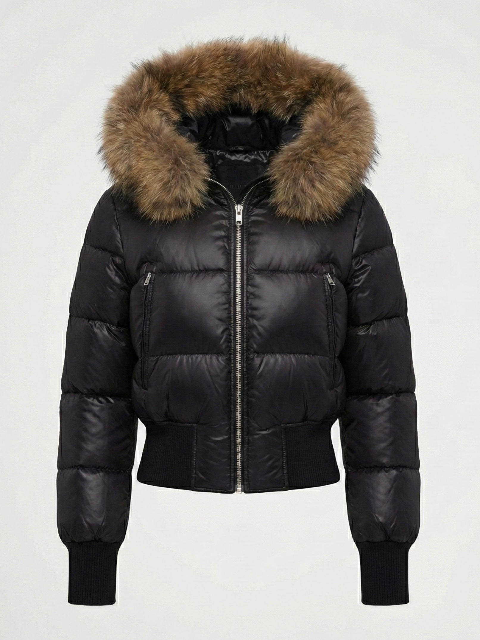 Black puffer jacket with padded quilted design and a plush faux fur hood. Features zip fastening, fitted waist and long sleeves, offering warmth and stylish winter protection.