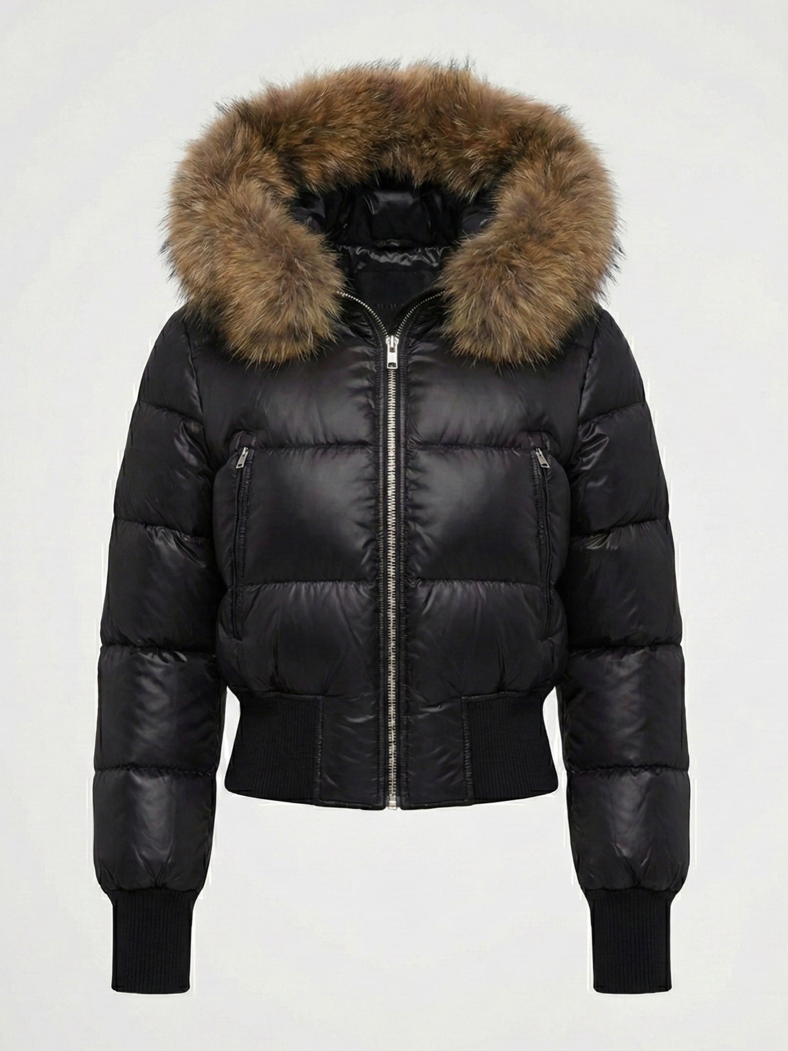 Black puffer jacket with padded quilted design and a plush faux fur hood. Features zip fastening, fitted waist and long sleeves, offering warmth and stylish winter protection.