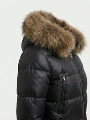 Black puffer jacket with padded quilted design and a plush faux fur hood. Features zip fastening, fitted waist and long sleeves, offering warmth and stylish winter protection.